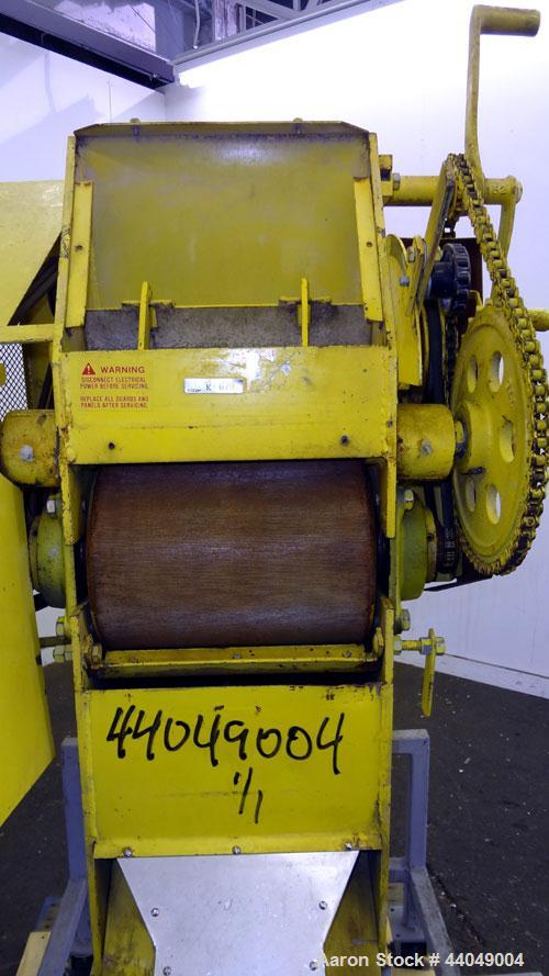 Used Roskamp Roller Mill, Model K, Carbon Steel. (2) Approximately 9" diameter x 12" wide grooved rolls, manually adjustable, 11" X 13" top feed, bottom discharge. Driven by a 7.5 hp, 3/60/230/460 vo...