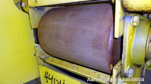 Used Roskamp Roller Mill, Model K, Carbon Steel. (2) Approximately 9" diameter x 12" wide grooved rolls, manually adjustable, 11" X 13" top feed, bottom discharge. Driven by a 7.5 hp, 3/60/230/460 vo...