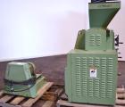 Used CPM Roskamp Series 900 Roller Mill, Type DP900-12, Carbon Steel.  (2) Pairs of  9’’ diameter x 12’’ wide rolls. Manually adjustable.  Manual feed gate adjustment, top feed hopper.  Driven by a 1...