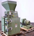 Used CPM Roskamp Series 900 Roller Mill, Type DP900-12, Carbon Steel.  (2) Pairs of  9’’ diameter x 12’’ wide rolls. Manually adjustable.  Manual feed gate adjustment, top feed hopper.  Driven by a 1...