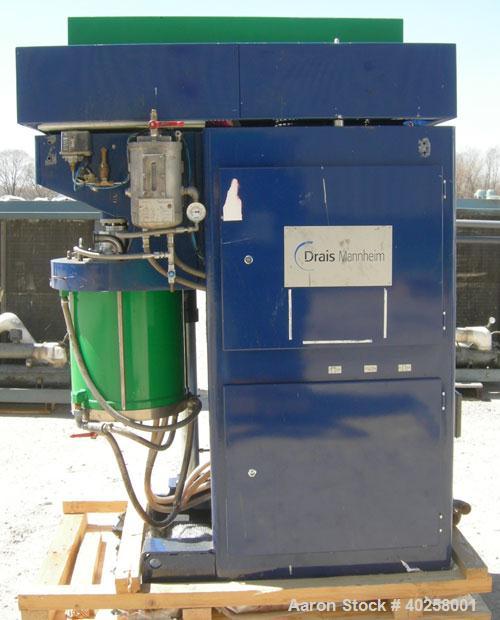 Used Drais SuperFlow high performance perl mill, model DCP-SF170C. 15 liter (3.9 gallon) carbon steel jacketed bowl 14 3/8" diameter x 19" deep rated 5 bar (72 psi) at 98 deg C (208 F).  Bowl has sta...