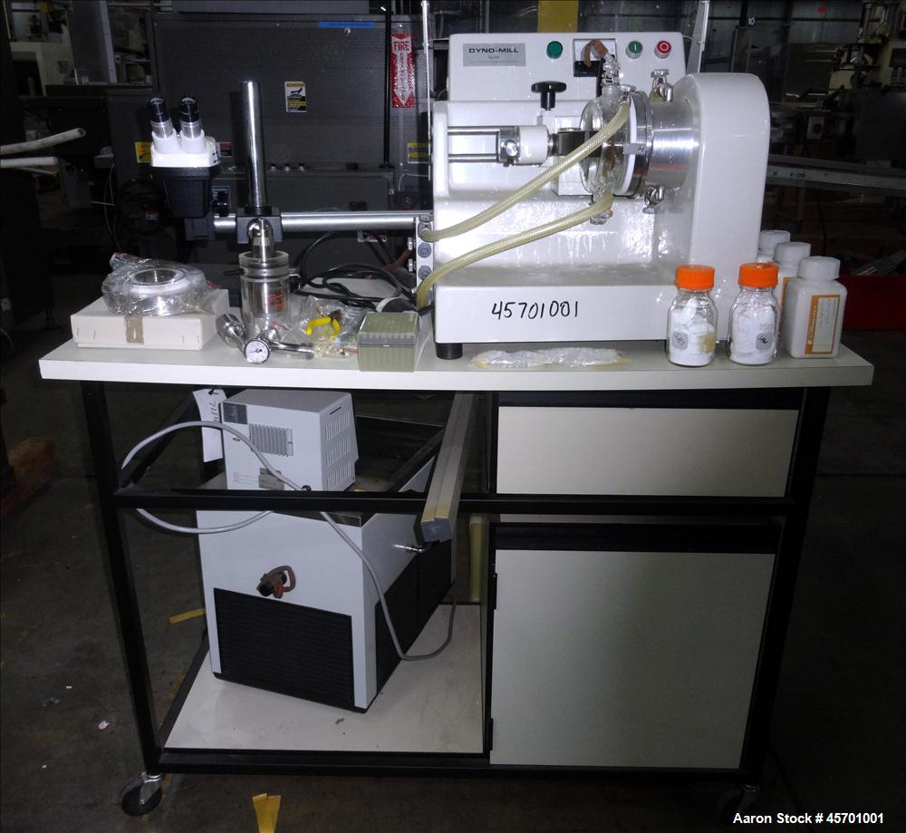 Used Dyno Mill Laboratory Mill, Model Type KDL, Horizontal. Approximately 0.3 liter glass grinding chamber, approximately 6" diameter x 2-1/4" deep. Has approximately 3.77" diameter polyurethane agit...