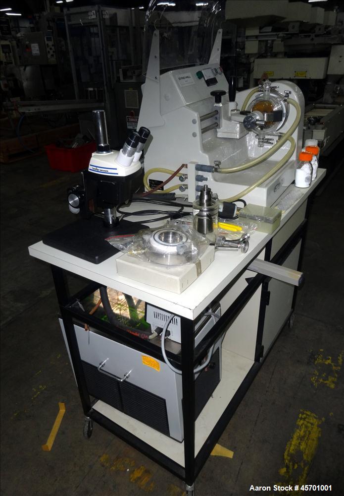 Used Dyno Mill Laboratory Mill, Model Type KDL, Horizontal. Approximately 0.3 liter glass grinding chamber, approximately 6" diameter x 2-1/4" deep. Has approximately 3.77" diameter polyurethane agit...