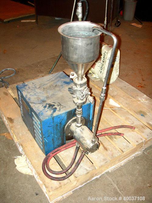 Used Eiger Mini Motor Media Mill, Model 250, stainless steel, horizontal. Approximately 250 ML jacketed chamber, up to 1 gallon batch capacity. Driven by an approximate 1/4 hp motor.
