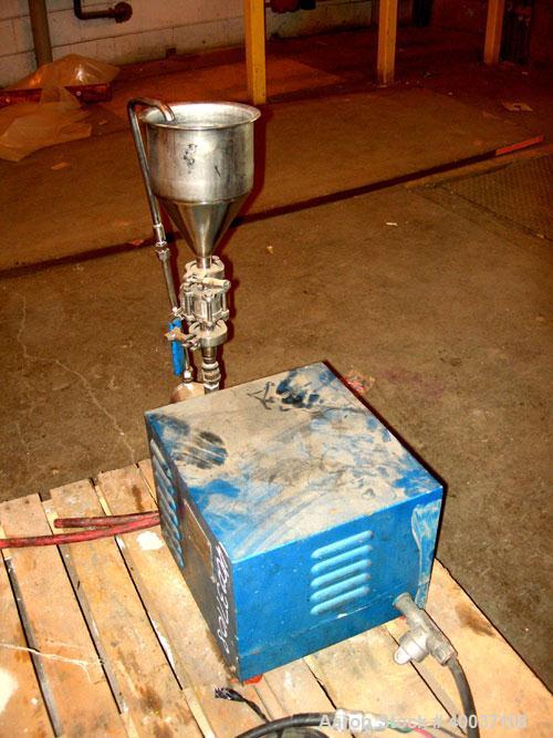 Used Eiger Mini Motor Media Mill, Model 250, stainless steel, horizontal. Approximately 250 ML jacketed chamber, up to 1 gallon batch capacity. Driven by an approximate 1/4 hp motor.
