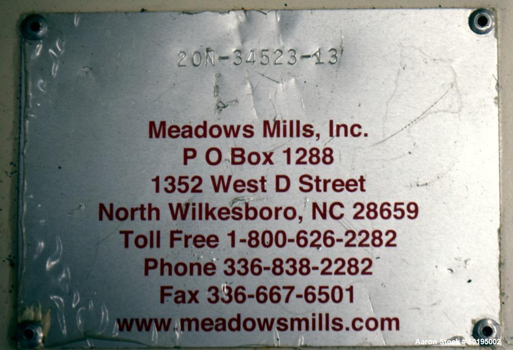 Used Meadows Mills Stone Burr Mill, Model 20N, Carbon Steel. Includes a feed hopper. Driven by a 10hp motor. Set up with blower discharge. Mounted on a frame with casters. Serial# 34523-13.  ADD 18% ...