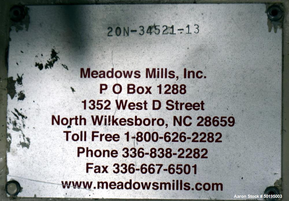 Used Meadows Mills Stone Burr Mill, Model 20N, Carbon Steel. Includes a feed hopper. Driven by a 10hp motor. Set up with blower discharge. Mounted on a frame with casters. Serial# 34521-13.  ADD 18% ...