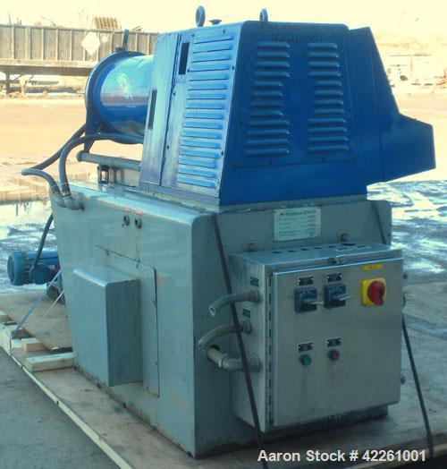 Used Morehose Cowles Zinger Horizontal Media Mill, Model LV-40F, 304 Stainless Steel. Approximately 11" diameter x 28" long stainless steel jacketed telescoping chamber, 10 gallon empty volume. Carbo...