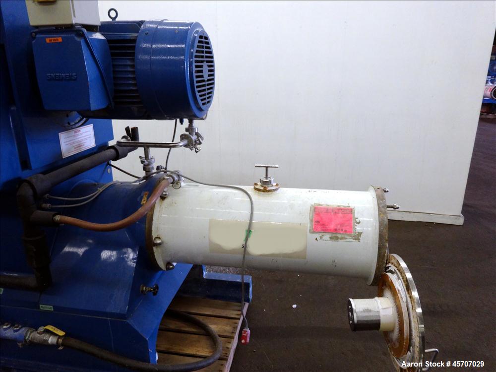 Used Netzsch Horizontal Media Mill, Model LMC60(E), Carbon Steel Jacketed Chamber, Porcelain Lined. Capacity 49.5 liters. Chamber approximately 11-3/4" diameter x 36" long with disc type agitator wit...