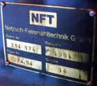USED: Netsch horizontal jacketed media mill, model 4, stainless steel. Approximate 5