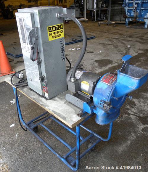 Used Gruendler Crusher & Pulverizer Axial Grinder/Hammer Mill, model “O”, carbon steel. Approximate 8" diameter x 3" deep chamber with (4) swinging stirrup hammers. Side hinged door with feed chute. ...