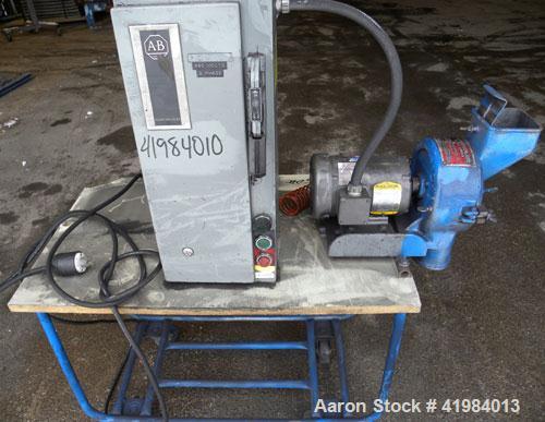 Used Gruendler Crusher & Pulverizer Axial Grinder/Hammer Mill, model “O”, carbon steel. Approximate 8" diameter x 3" deep chamber with (4) swinging stirrup hammers. Side hinged door with feed chute. ...