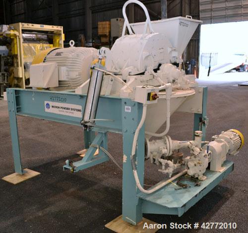 Used Micron Powder Systems Mikro Pulverizer Hammer Mill, Model 4SCB, Carbon Steel. 20" Diameter x 12" wide rotor with 4 rows swinging stirrup hammers. Top gravity feed hopper, no bottom screen. Botto...