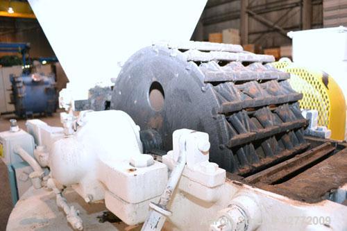 Used Mikro Pulverizer Hammer Mill, Model 4TH, Carbon Steel. 20" Diameter x 12" wide rotor with 4 rows swinging stirrup hammers. Top feed hopper with a triple screw feed, driven by a 2 hp, 3/60/460 vo...