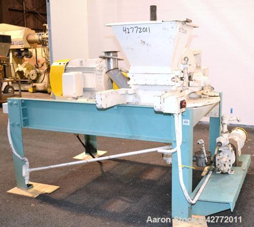 Used Mikro Pulverizer Hammer Mill, Model 4TH, Carbon Steel. 20" Diameter x 12" wide rotor with 4 rows swinging stirrup hammers. Top gravity feed hopper, bottom screen. Bottom discharge hopper with a ...
