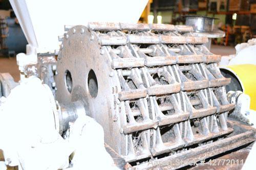 Used Mikro Pulverizer Hammer Mill, Model 4TH, Carbon Steel. 20" Diameter x 12" wide rotor with 4 rows swinging stirrup hammers. Top gravity feed hopper, bottom screen. Bottom discharge hopper with a ...