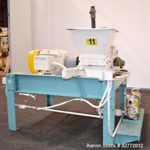 Used Mikro Pulverizer Hammer Mill, Model 4TH, Carbon Steel. 20" Diameter x 12" wide rotor with 4 rows swinging stirrup hammers. Top gravity feed hopper, bottom screen. Bottom discharge hopper with a ...