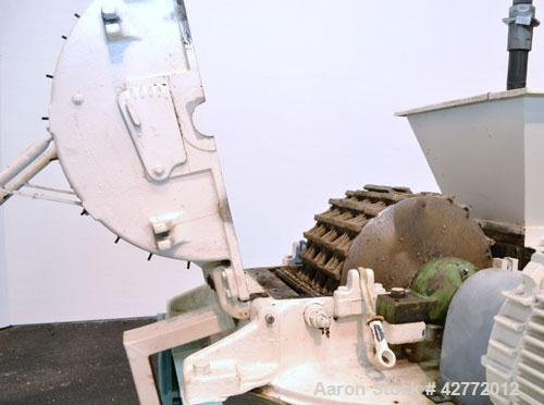 Used Mikro Pulverizer Hammer Mill, Model 4TH, Carbon Steel. 20" Diameter x 12" wide rotor with 4 rows swinging stirrup hammers. Top gravity feed hopper, bottom screen. Bottom discharge hopper with a ...
