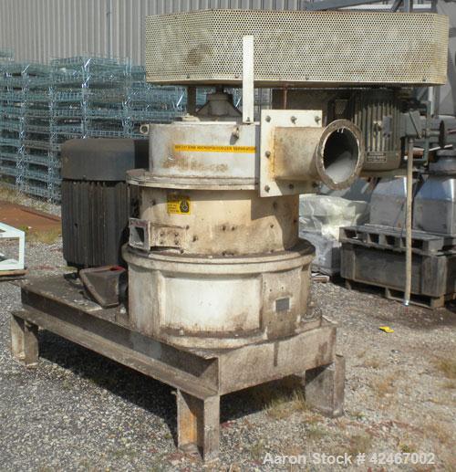 Used Micron Powder Systems Air Classifying Mill, Model 60ACM, Carbon Steel. Approximate 30’’ diameter grinding chamber. Maximum rotor speed 3000 rpm, driven by a 125hp, 3/60/460 volt, 1780 rpm motor....