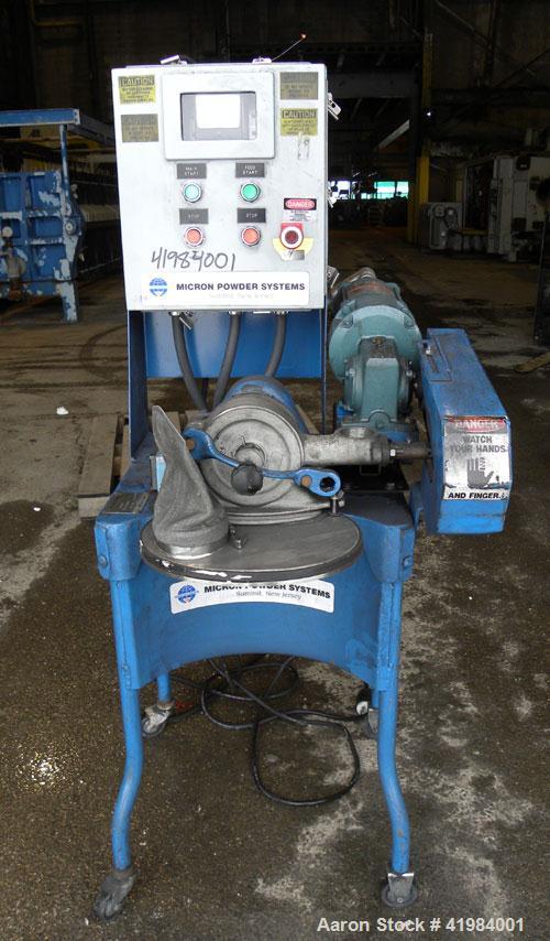 Used Micron Powder Systems Mikro Bantam Pulverizer Hammer Mill, Model 611072EX, 304 Stainless Steel. Approximate 5-1/4" diameter x 1-1/2" deep chamber with (6) swinging stirrup hammers. 1’’ diameter ...