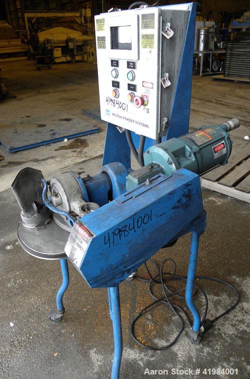 Used Micron Powder Systems Mikro Bantam Pulverizer Hammer Mill, Model 611072EX, 304 Stainless Steel. Approximate 5-1/4" diameter x 1-1/2" deep chamber with (6) swinging stirrup hammers. 1’’ diameter ...