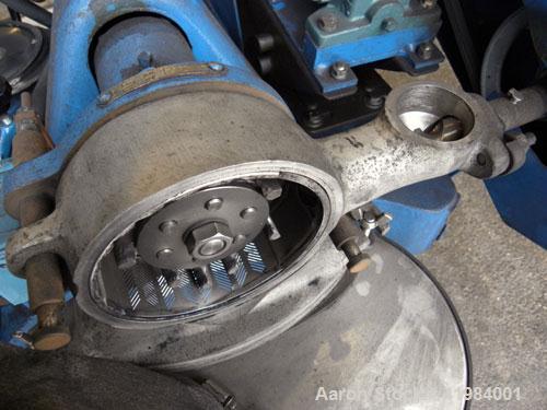 Used Micron Powder Systems Mikro Bantam Pulverizer Hammer Mill, Model 611072EX, 304 Stainless Steel. Approximate 5-1/4" diameter x 1-1/2" deep chamber with (6) swinging stirrup hammers. 1’’ diameter ...