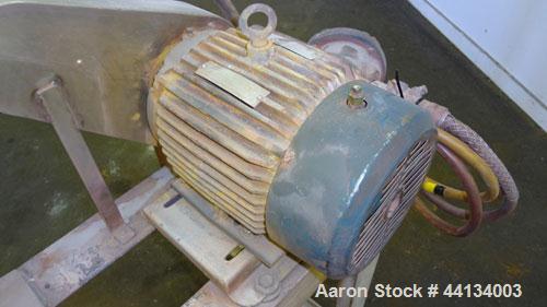 Used Mikro Pulverizer Hammer Mill, Model 1SH, 304 Stainless Steel. Approximately 8" diameter x 3-1/2" deep chamber with (6) 3” wide swinging stirrup hammers. Dual screw feed with hopper, driven by a ...