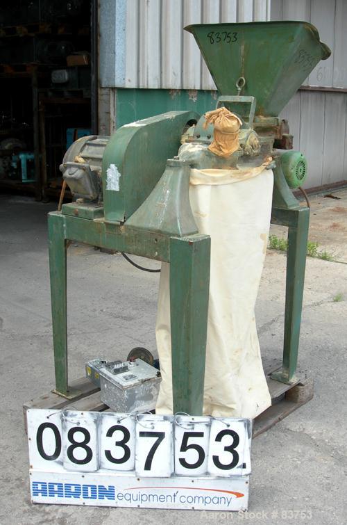 USED: Mikro Pulverizer Model 1SH, carbon steel. Approximate 6" diameter rotor with (6) 3" wide swinging stirrup hammers. 1-1/2" diameter x 8" long screw feed with hopper, driven by a 1/3 hp, 1/60/115...