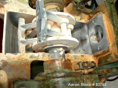 USED: Mikro Pulverizer Model 1SH, carbon steel. Approximate 6" diameter rotor with (6) 3" wide swinging stirrup hammers. 1-1/2" diameter x 8" long screw feed with hopper, driven by a 1/3 hp, 1/60/115...
