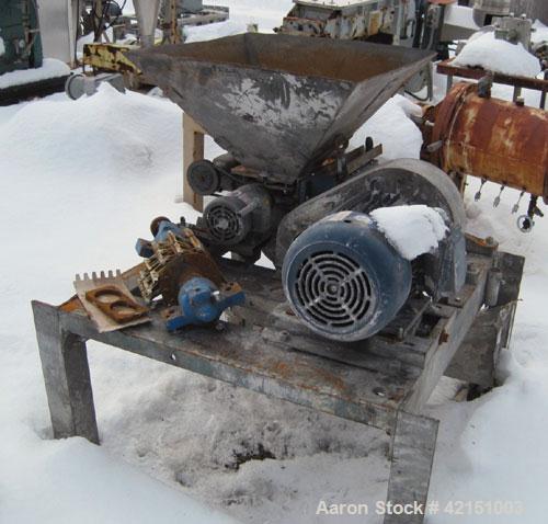 Used Mikro Pulverizer, Model 2DH, Carbon Steel. Rotor with (2) rows of swinging hammers. Dual screw feed driven by a 3/4 hp, 3/60/208-220/440 volt motor. Main drive is 15 hp, 3/60/208-220/440 volt mo...