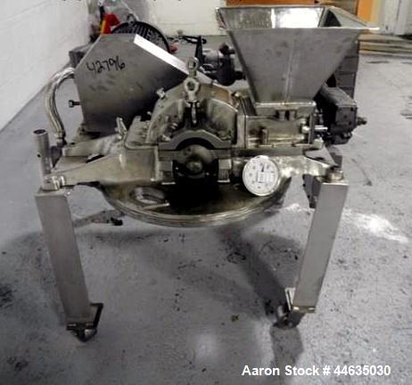 Used Mikro Pulverizer, Model 2DH. 316 Stainless steel construction, twin horizontal screw feeder with 0.5 hp drive, on stainless steel base with 20 hp 230/460 volt main drive, XP design, serial# 5930...