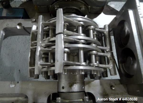Used Mikro Pulverizer, Model 2DH. 316 Stainless steel construction, twin horizontal screw feeder with 0.5 hp drive, on stainless steel base with 20 hp 230/460 volt main drive, XP design, serial# 5930...
