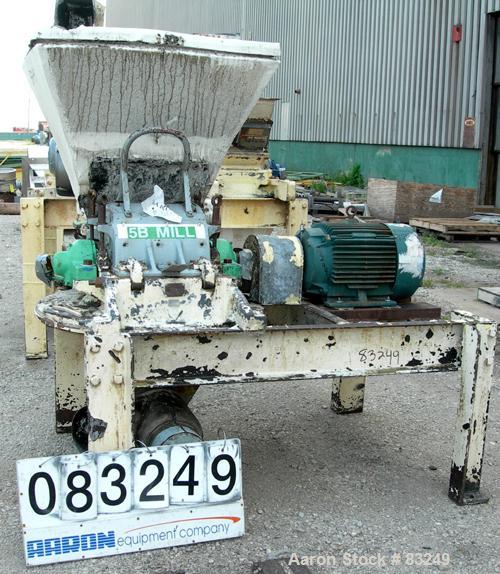 Used Mikro Pulverizer, Model 3TH, Carbon Steel. 14" Diameter x 14" wide rotor with approximately 14 rows of 4 swinging stirrup hammers. Triple screw feed with hopper, approximately 3" diameter screws...