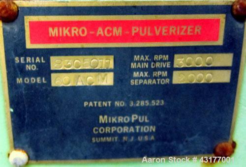 Used Mikro-ACM Pulverizer, Model 60 ACM CI, 304 Stainless Steel. 30" Diameter grinding chamber. Rotor driven by a 75 hp, 3/60/230/460 volt, 1775 rpm motor. Maximum rotor rpm 3000. 3000 to 4500 cfm ca...