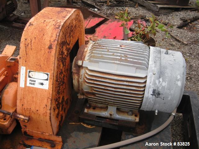 USED: Pulva Corp Pulverizer, model C, carbon steel. Double screw feed. Driven by a 3/4 hp motor. Main drive is a 40 hp, 230/460 volt motor. Base mounted.