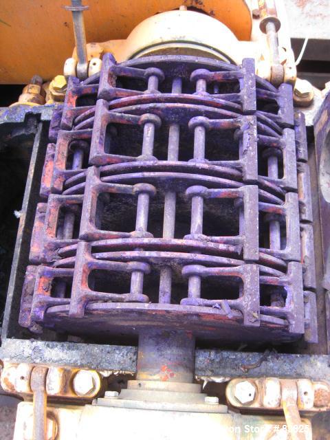 USED: Pulva Corp Pulverizer, model C, carbon steel. Double screw feed. Driven by a 3/4 hp motor. Main drive is a 40 hp, 230/460 volt motor. Base mounted.
