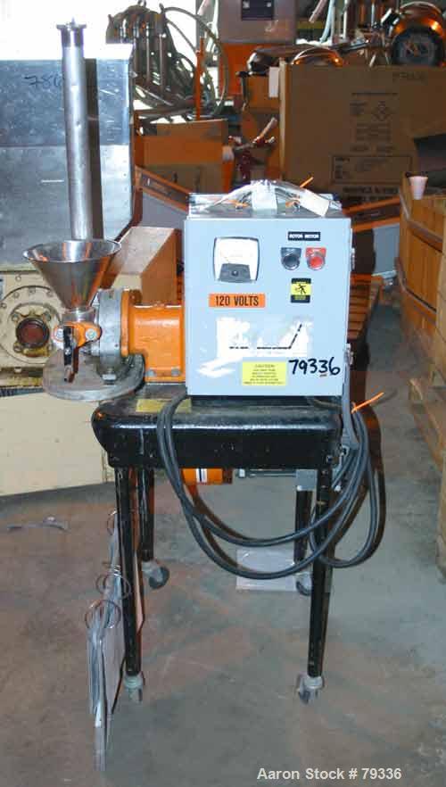 Used Pulvette Pulva-Sizer Hammermill, 304 Stainless Steel. 5" diameter rotor with (6) 1-1/4" wide T style swing hammers. Has gravity feed and a 7/8" diameter manual screw feed. Mill driven by a 1 HP,...