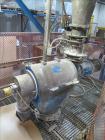 Used Hosokawa Mikropul Pulverizer, Model 30ACM.  Carbon Steel Construction.  Includes; Kemutec Sifter, Model K650, Cyclone, Mikro-Pulsaire Dust Collector, Schmalz Box Lifter, Toledo Scale and Control...