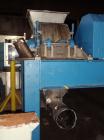 Used Micron Powder System Pulverizer, Model 4TH, stainless steel. Triple horizontal screw feeder with hopper. Pulverizer driven by a 75 hp motor. Mounted on a carbon steel frame.