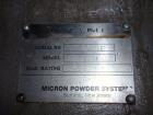 Used Micron Powder System Pulverizer, Model 4TH, stainless steel. Triple horizontal screw feeder with hopper. Pulverizer driven by a 75 hp motor. Mounted on a carbon steel frame.