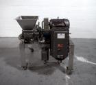 Used Mikro Pulverizer, Model 2DH. 316 Stainless steel construction, twin horizontal screw feeder with 0.5 hp drive, on stainless steel base with 20 hp 230/460 volt main drive, XP design, serial# 5930...