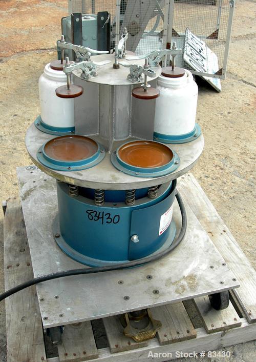 USED: Sweco vibro energy grinding mill, model M18. Unit can accept (5) 5" diameter x 5-1/2" deep ceramic jars, (2) included. (5) Lid clamps and jar holders. Driven by a 1/4 hp, 3/60/440 volt, 1140 rp...