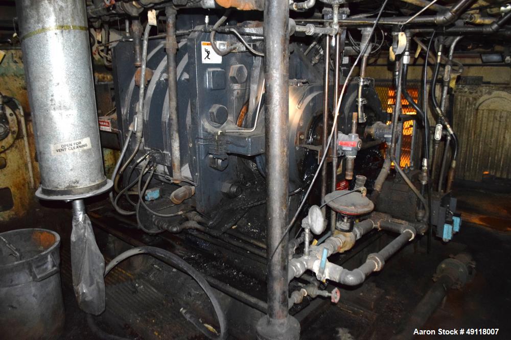 Used Farrel Banbury Mixer, Model 9D. Approximate chamber gross volume 182 liters (48 gallons, 11,120 cubic inches), approximate compound capacity 390 pounds. Jacketed chrome plated sides and door top...