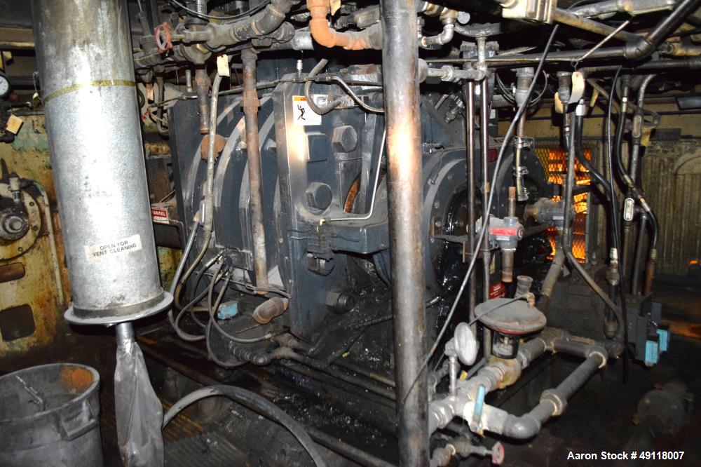 Used Farrel Banbury Mixer, Model 9D. Approximate chamber gross volume 182 liters (48 gallons, 11,120 cubic inches), approximate compound capacity 390 pounds. Jacketed chrome plated sides and door top...