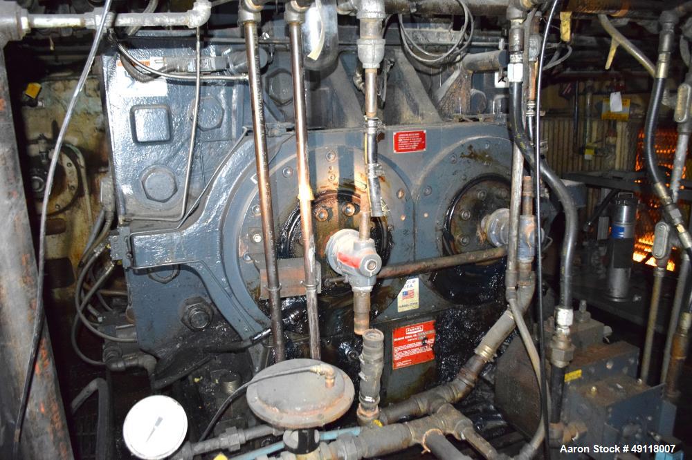 Used Farrel Banbury Mixer, Model 9D. Approximate chamber gross volume 182 liters (48 gallons, 11,120 cubic inches), approximate compound capacity 390 pounds. Jacketed chrome plated sides and door top...