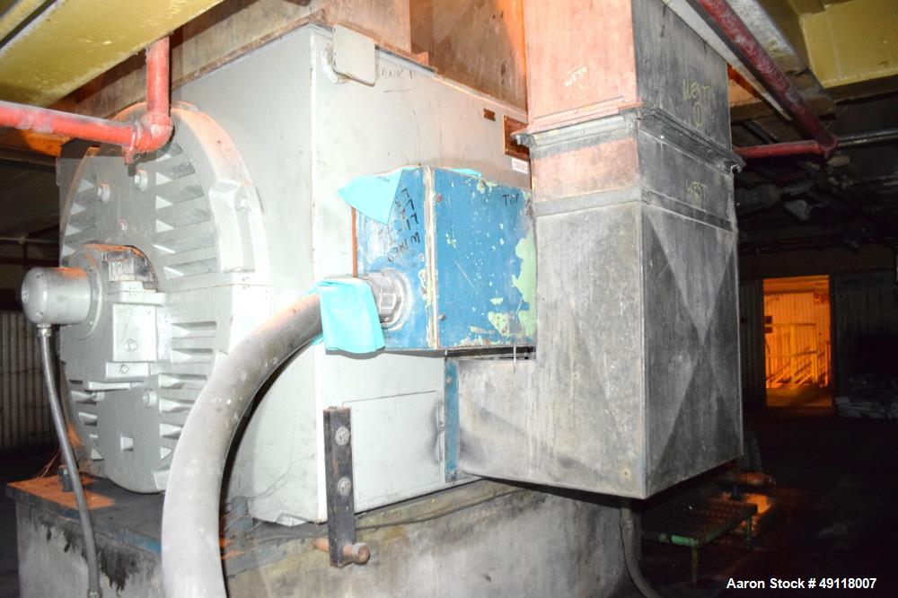 Used Farrel Banbury Mixer, Model 9D. Approximate chamber gross volume 182 liters (48 gallons, 11,120 cubic inches), approximate compound capacity 390 pounds. Jacketed chrome plated sides and door top...