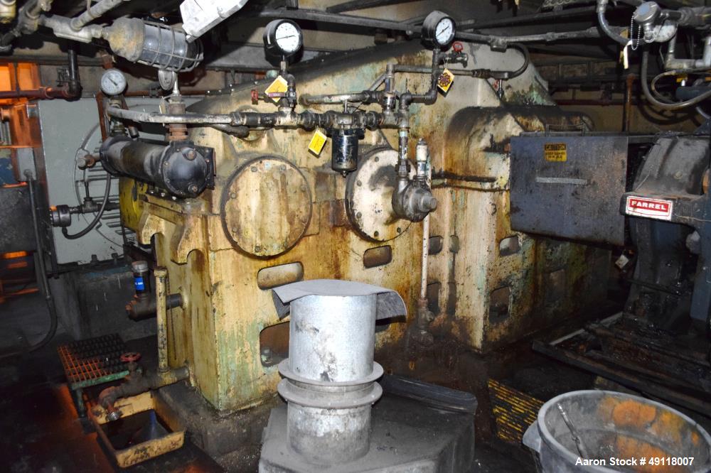 Used Farrel Banbury Mixer, Model 9D. Approximate chamber gross volume 182 liters (48 gallons, 11,120 cubic inches), approximate compound capacity 390 pounds. Jacketed chrome plated sides and door top...