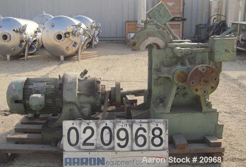 Used Banbury Mixer, Model 00, Carbon Steel. Chrome plated steel rotor, body and ends. Capacity 5 pounds at 1.25 SP gravity, cored rotors and bowl. Flat style floating weight. Side open swing doors (2...