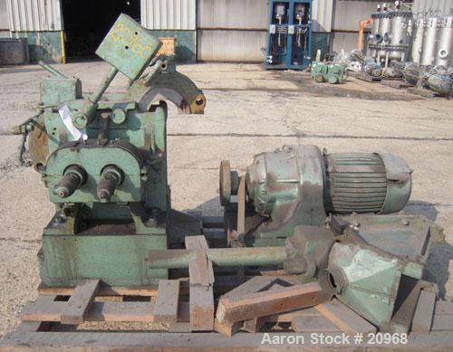 Used Banbury Mixer, Model 00, Carbon Steel. Chrome plated steel rotor, body and ends. Capacity 5 pounds at 1.25 SP gravity, cored rotors and bowl. Flat style floating weight. Side open swing doors (2...