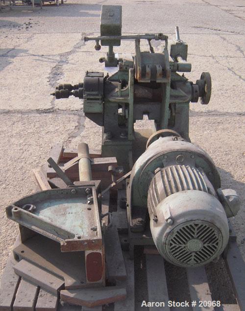 Used Banbury Mixer, Model 00, Carbon Steel. Chrome plated steel rotor, body and ends. Capacity 5 pounds at 1.25 SP gravity, cored rotors and bowl. Flat style floating weight. Side open swing doors (2...